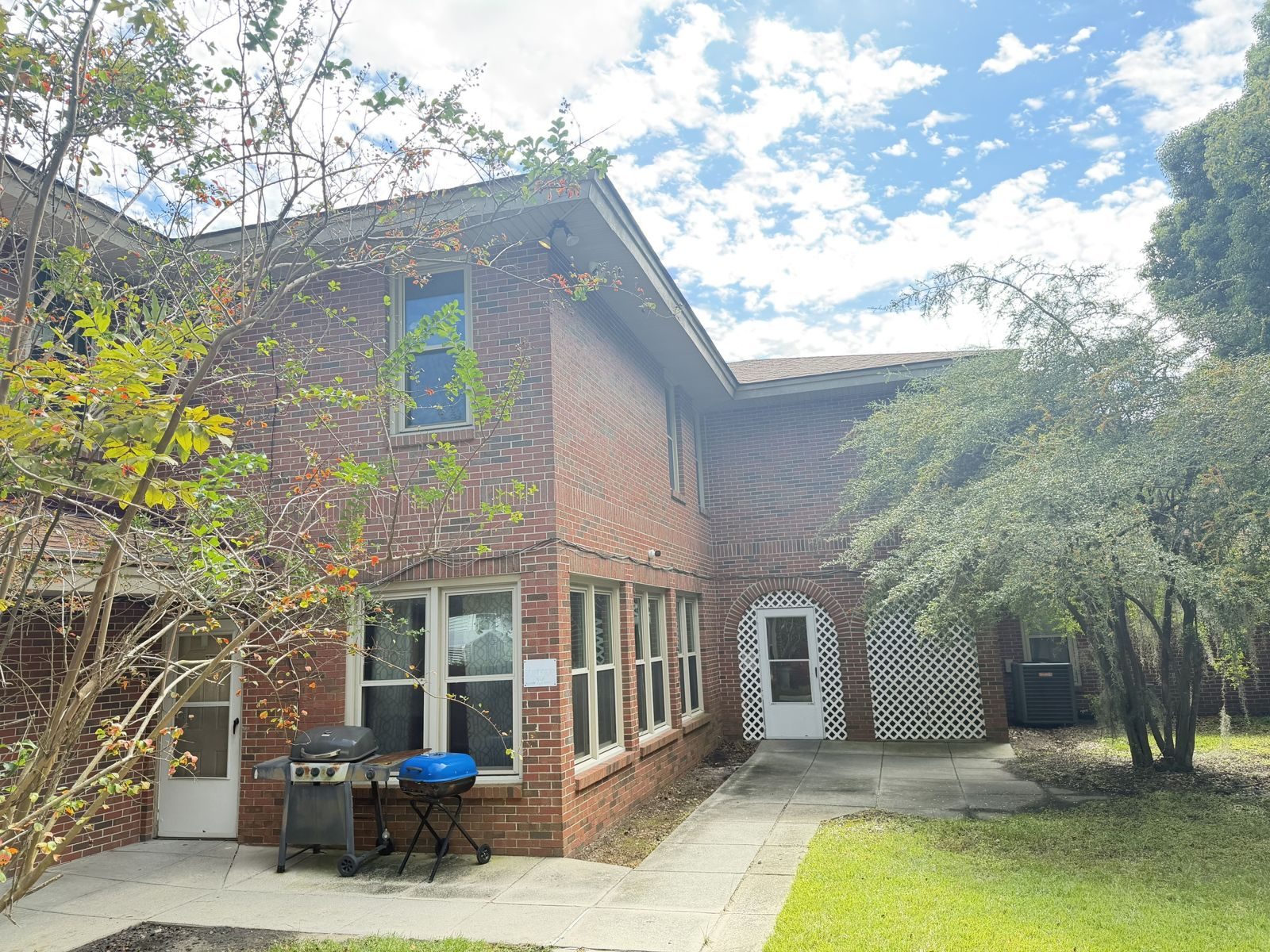 Courtyard entrance of a brick home